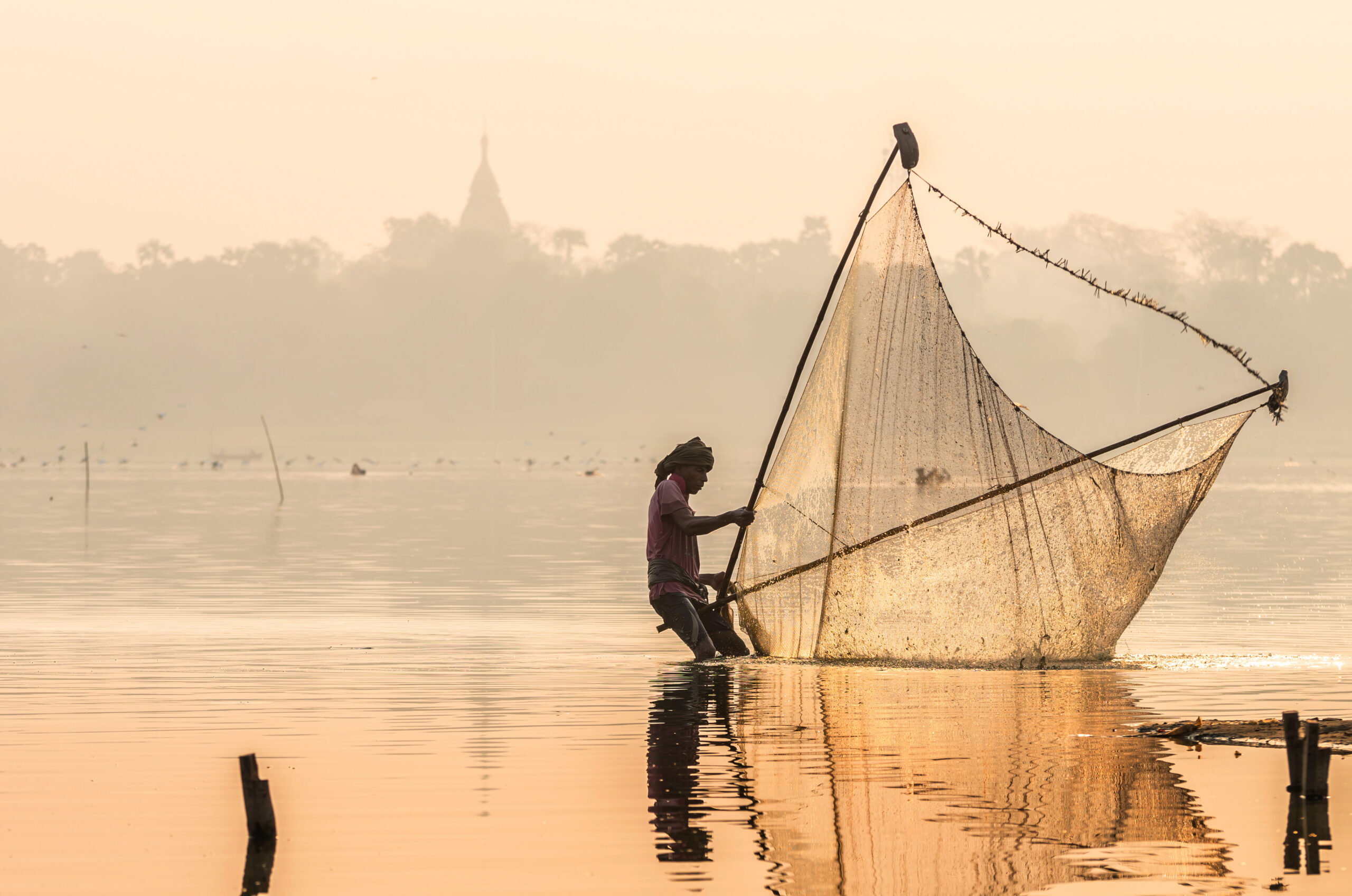fishermen-fishing-by-traditional-net-in-the-river-2022-02-01-22-37-01-utc-scaled
